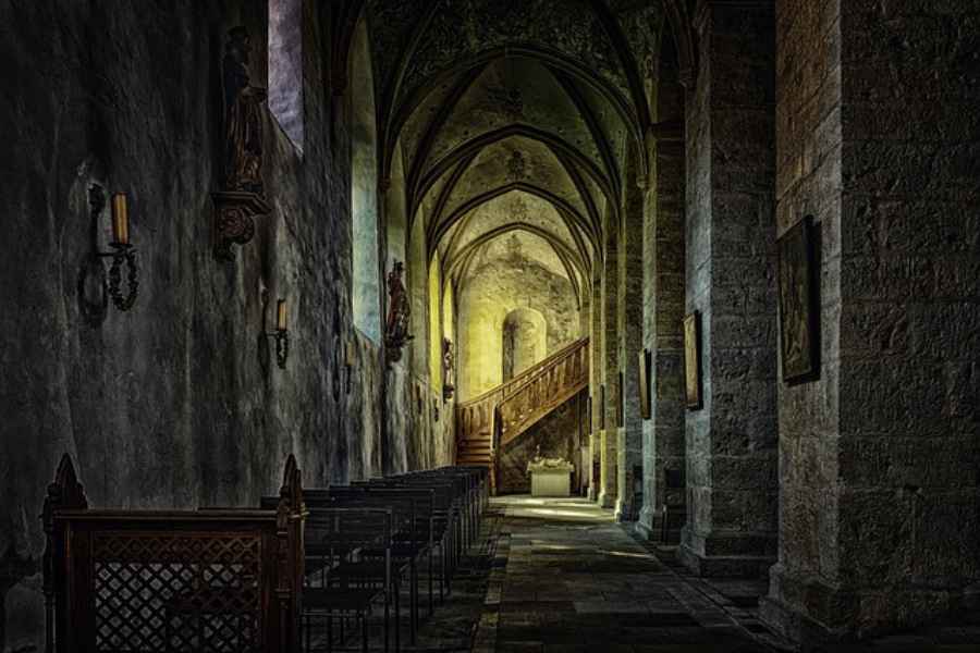 inside an old church with vaulted ceilings